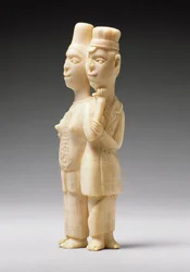Figuren eines Mannes in europäischer Kleidung und einer afrikanischen Frau, Kongo
